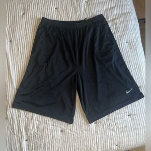 Men’s black Nike athletic shorts, size M